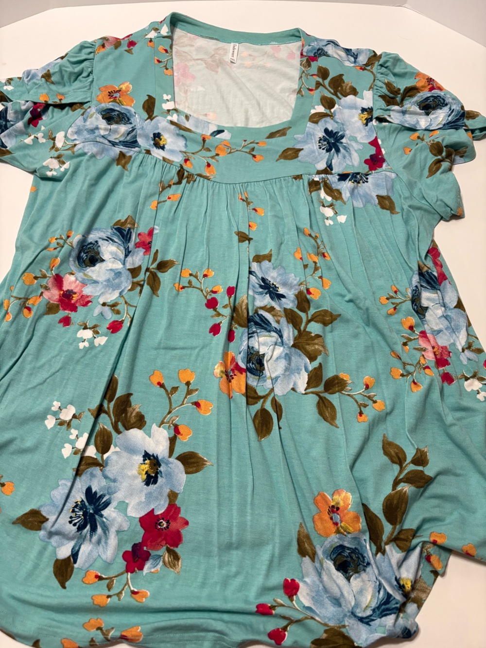 Women's size 4X Floral Short Fluted Sleeve Flowered Tee in Aqua